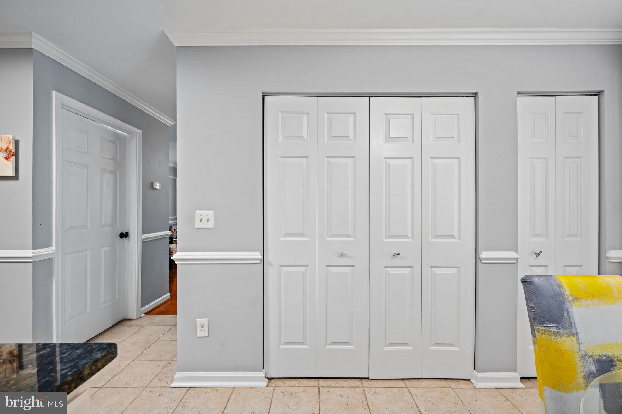 9332 Wax Myrtle Way Manassas, VA 20110 - Photo 30 of 50 a view of a kitchen with wooden cabinets