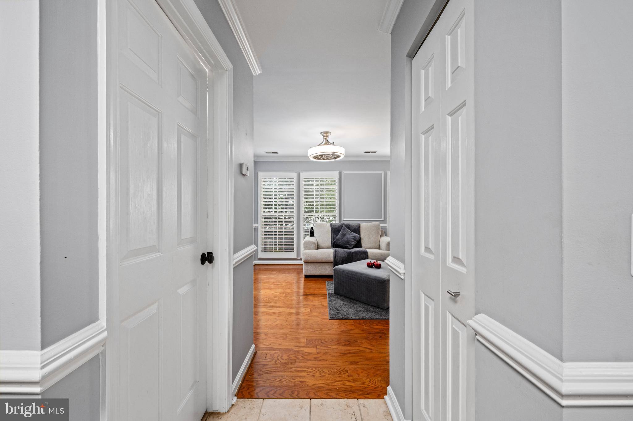 9332 Wax Myrtle Way Manassas, VA 20110 - Photo 32 of 50 a living room with furniture window and wooden floor
