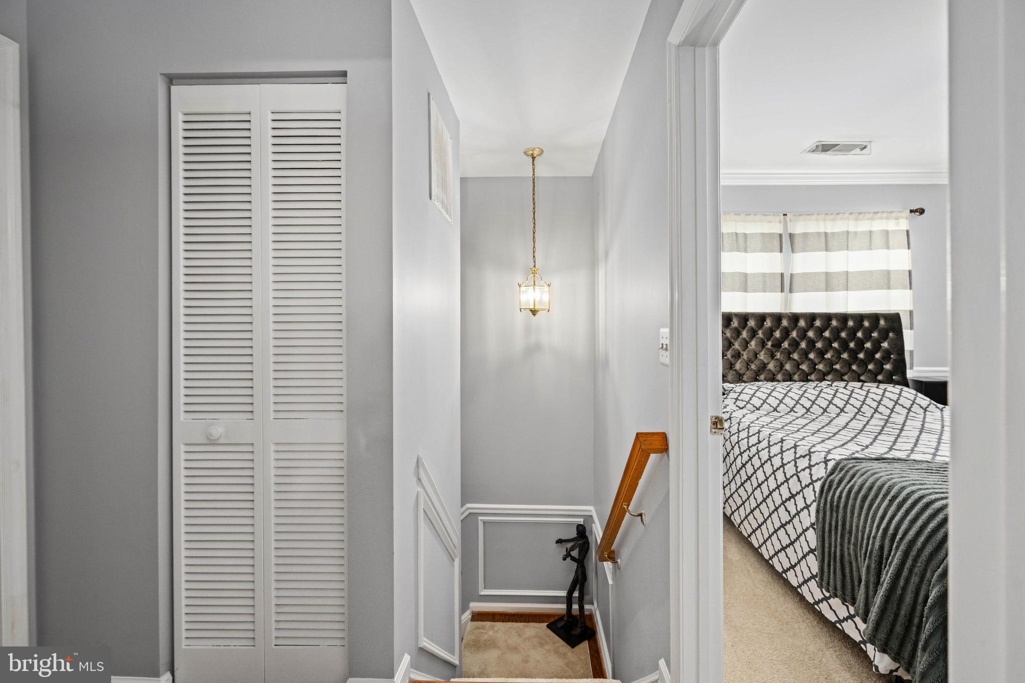 9332 Wax Myrtle Way Manassas, VA 20110 - Photo 42 of 50 a bedroom with a bed and a window