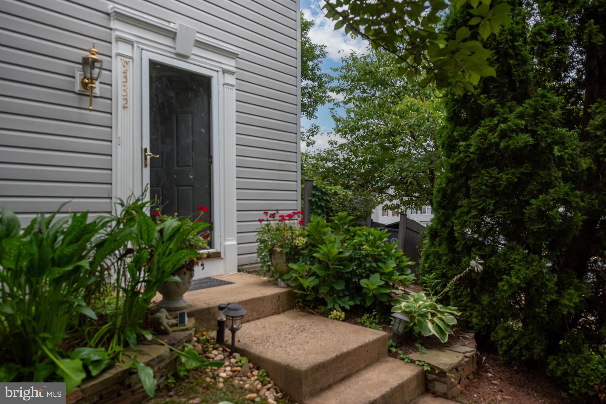 9332 Wax Myrtle Way Manassas, VA 20110 - Photo 6 of 50 a view of a backyard with plants