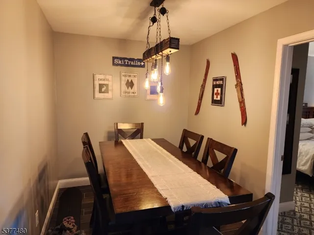 a view of a dining room with furniture