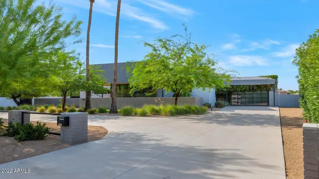 a view of a building with a yard