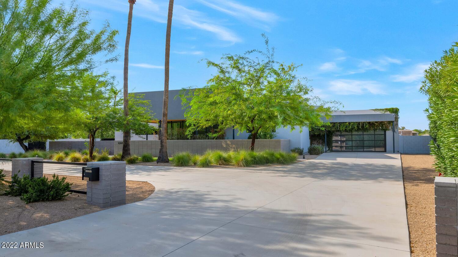 a view of a building with a yard