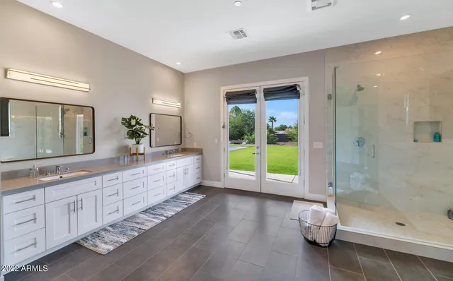 a view of a livingroom with furniture and a kitchen