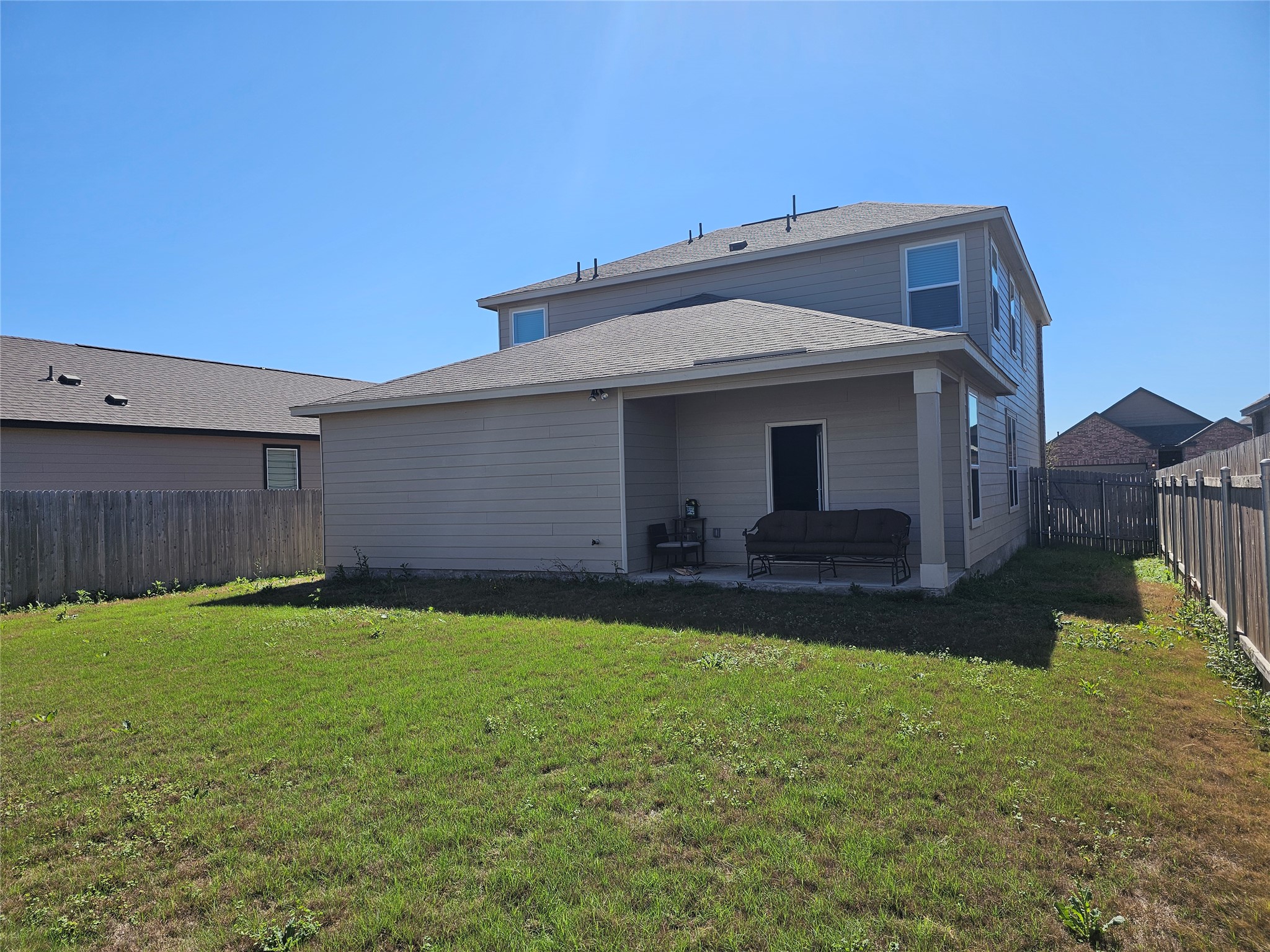 210 Summit Drive Lockhart, TX 78644 - Photo 2 of 21 a front view of a house with yard