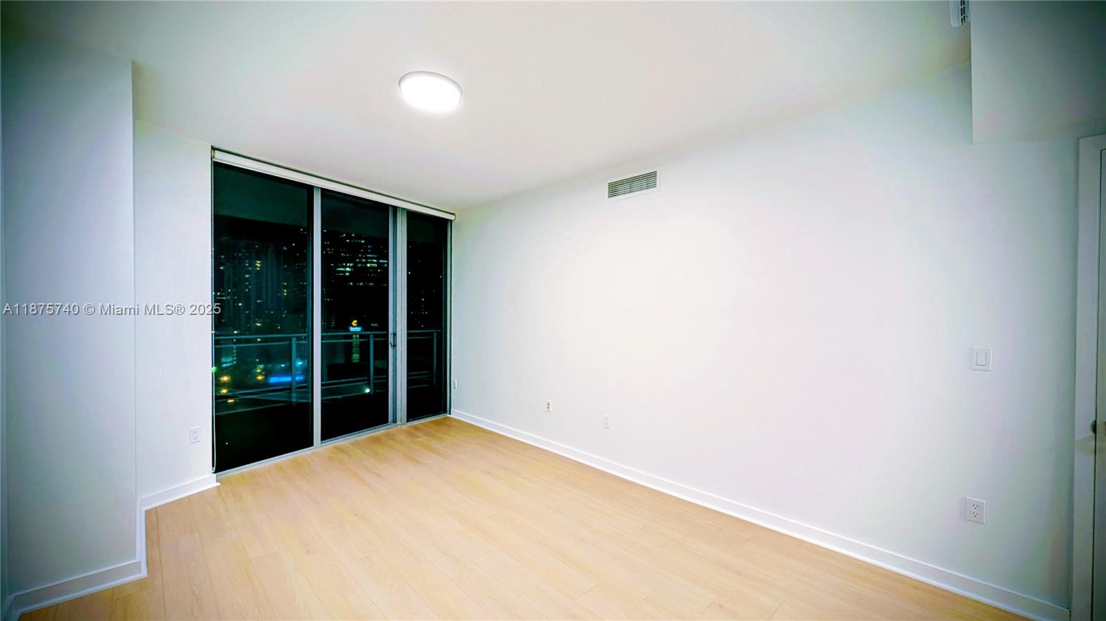 350 South Miami Avenue, Unit 1901 Miami, FL 33130 - Photo 24 of 81 a view of an empty room with a window