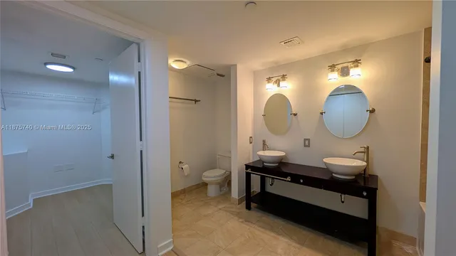 a view of an empty walk in closet