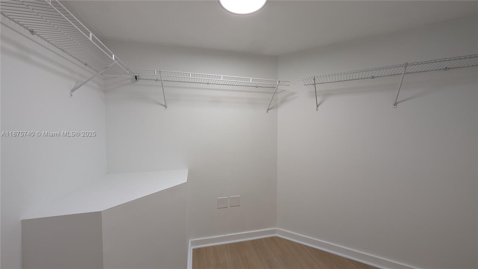 350 South Miami Avenue, Unit 1901 Miami, FL 33130 - Photo 28 of 81 a view of a room with racks on the wall