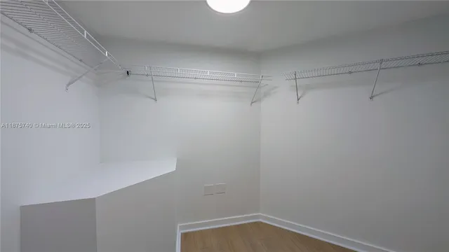 a bathroom with a mirror and a shower curtain