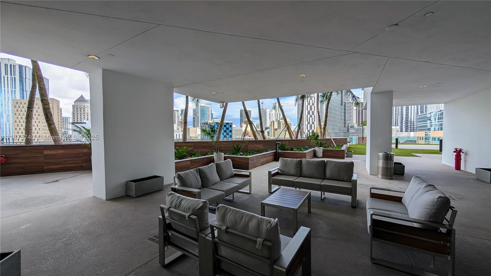 350 South Miami Avenue, Unit 1901 Miami, FL 33130 - Photo 64 of 81 a living room with furniture and a large window