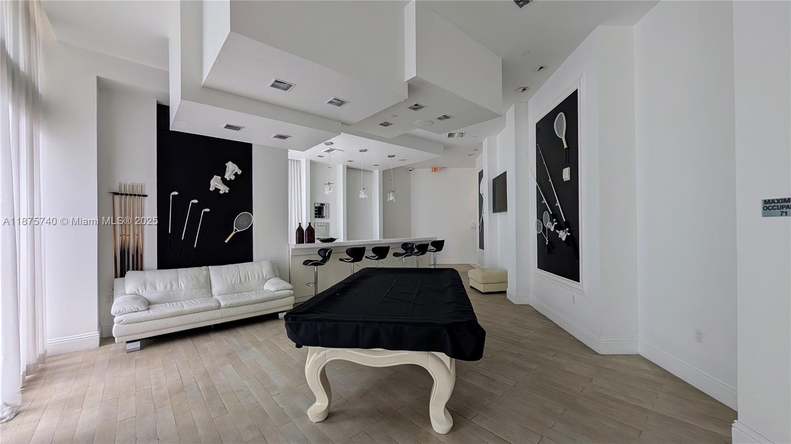 350 South Miami Avenue, Unit 1901 Miami, FL 33130 - Photo 67 of 81 a living room with furniture and a walk in closet