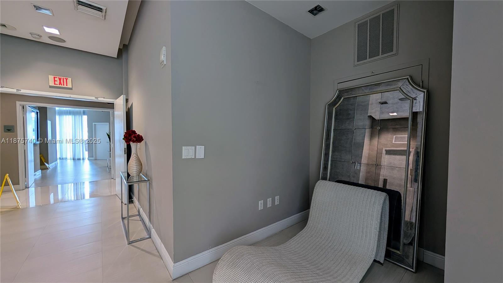 350 South Miami Avenue, Unit 1901 Miami, FL 33130 - Photo 74 of 81 a view of a hallway with entryway and wooden floor