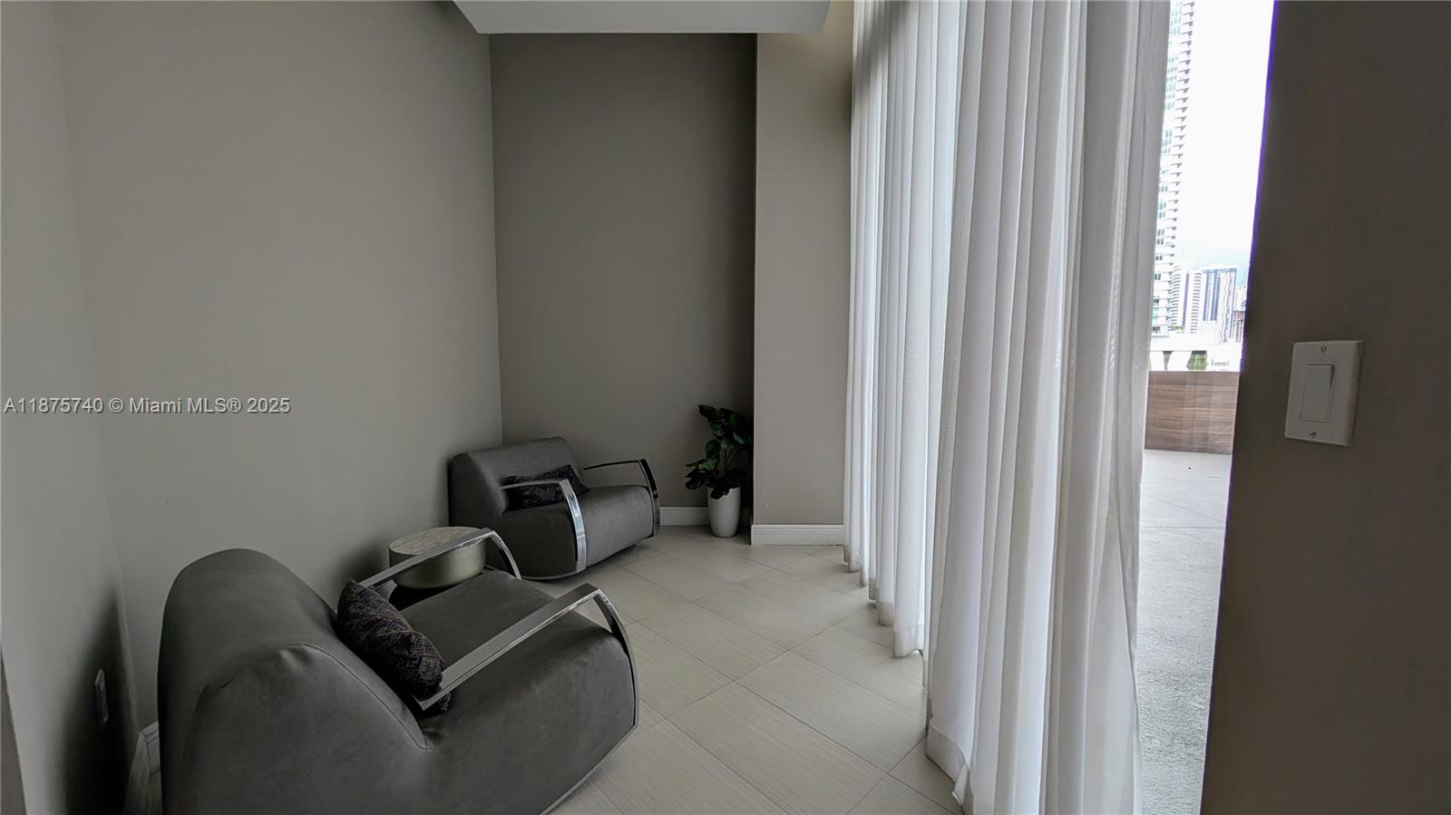 350 South Miami Avenue, Unit 1901 Miami, FL 33130 - Photo 75 of 81 a room with furniture and a window