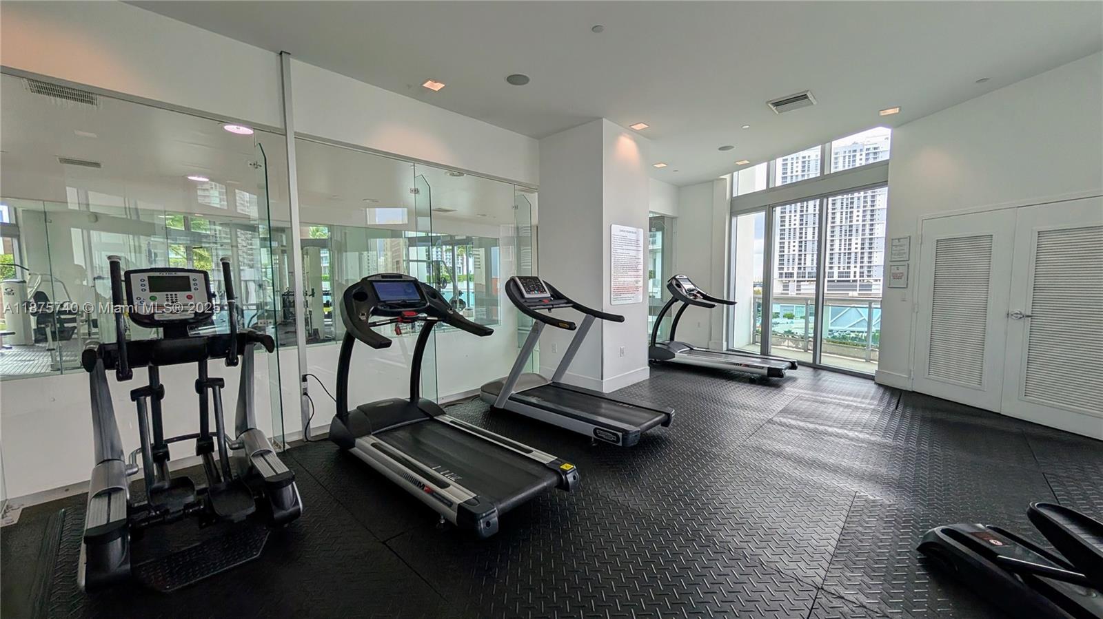 350 South Miami Avenue, Unit 1901 Miami, FL 33130 - Photo 80 of 81 a view of a room with gym equipment