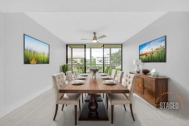 a view of a dining room with furniture window and outside view