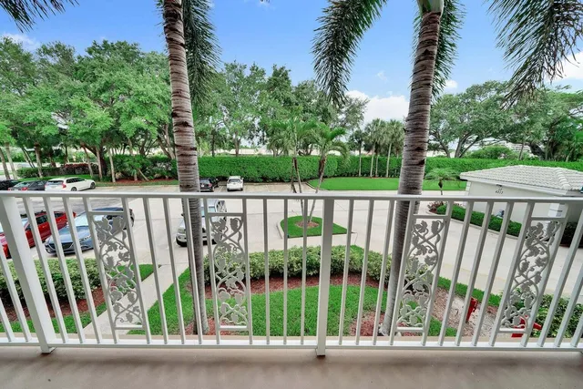 a view of a balcony with a garden