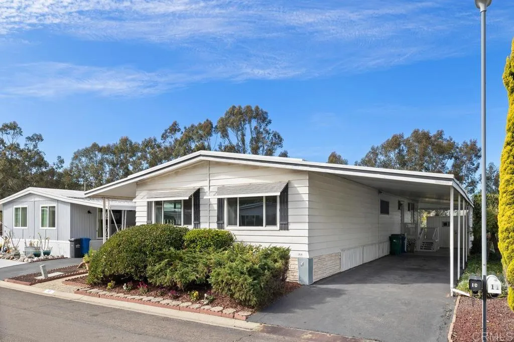 7467 Mission Gorge Road, Unit SPC 10 Santee, CA 92071 - Photo 3 of 44 a view of house and outdoor space