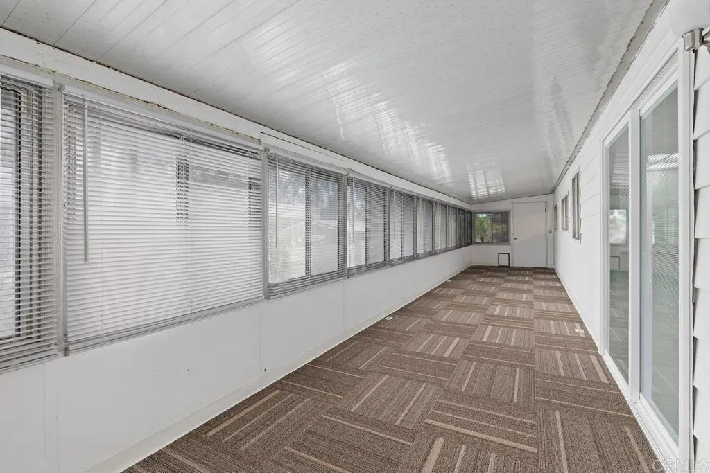 7467 Mission Gorge Road, Unit SPC 10 Santee, CA 92071 - Photo 32 of 44 a view of a porch