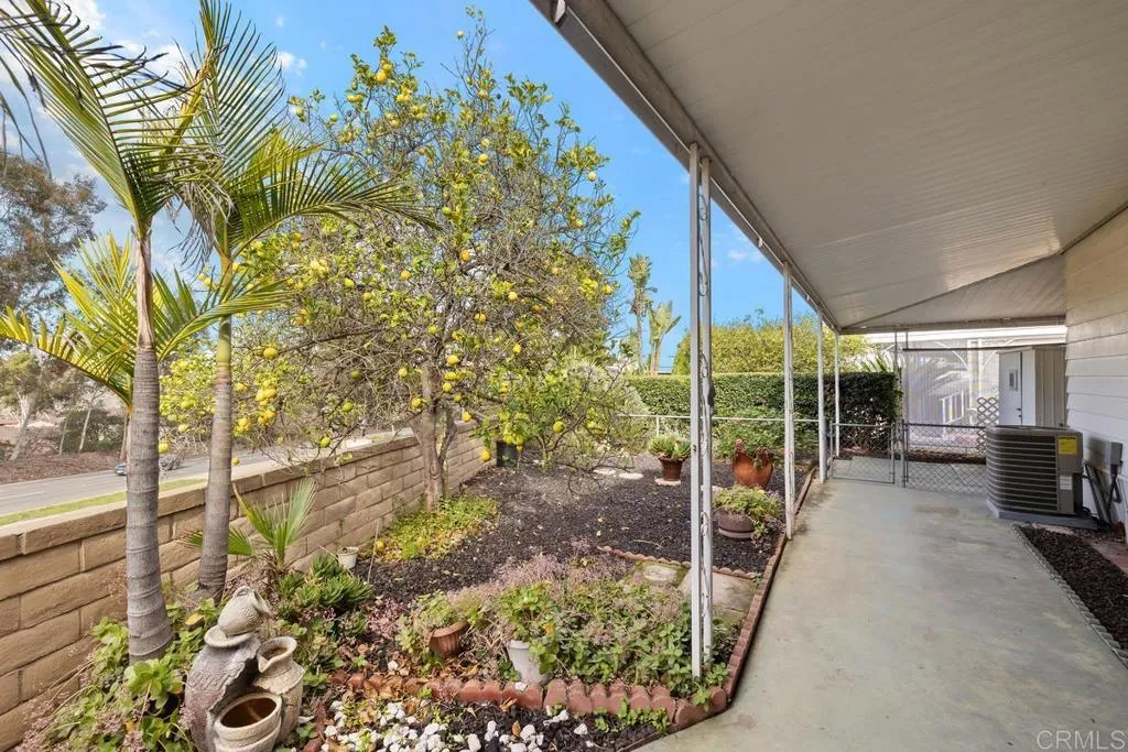 7467 Mission Gorge Road, Unit SPC 10 Santee, CA 92071 - Photo 36 of 44 a view of backyard with green space