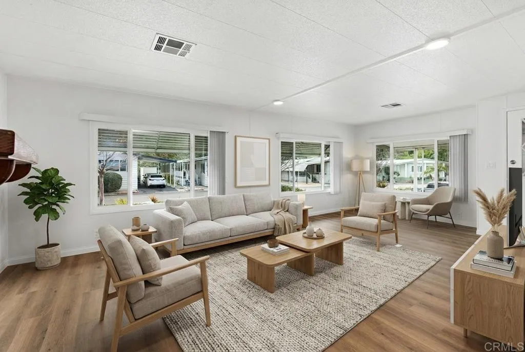7467 Mission Gorge Road, Unit SPC 10 Santee, CA 92071 - Photo 5 of 44 a living room with furniture and a large window