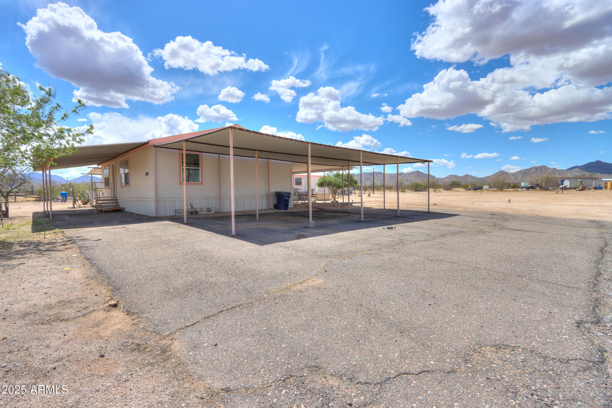 270 North Ralston Road Maricopa, AZ 85139 - Photo 74 of 75 a view of a house with a yard
