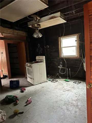 a view of room with gym equipment