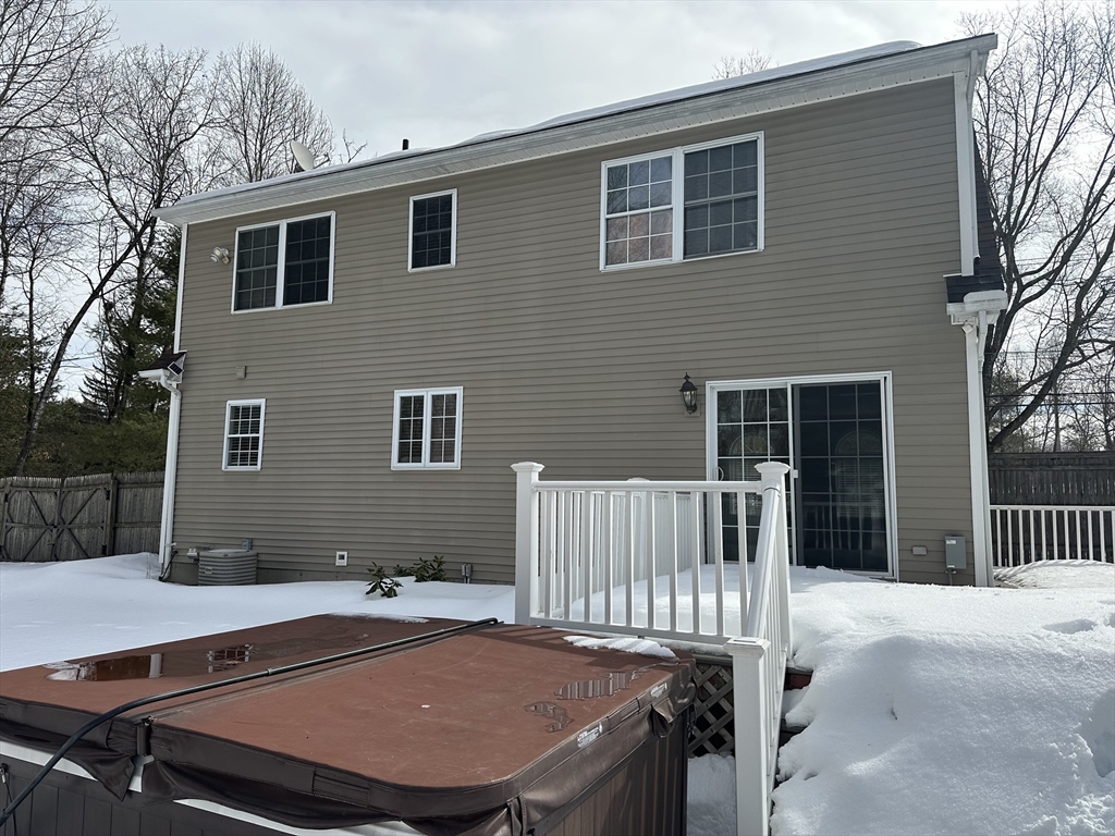 54 Old Fuller Rd Extension Chicopee, MA 01020 - Photo 2 of 25 a view of a patio with a table and chairs