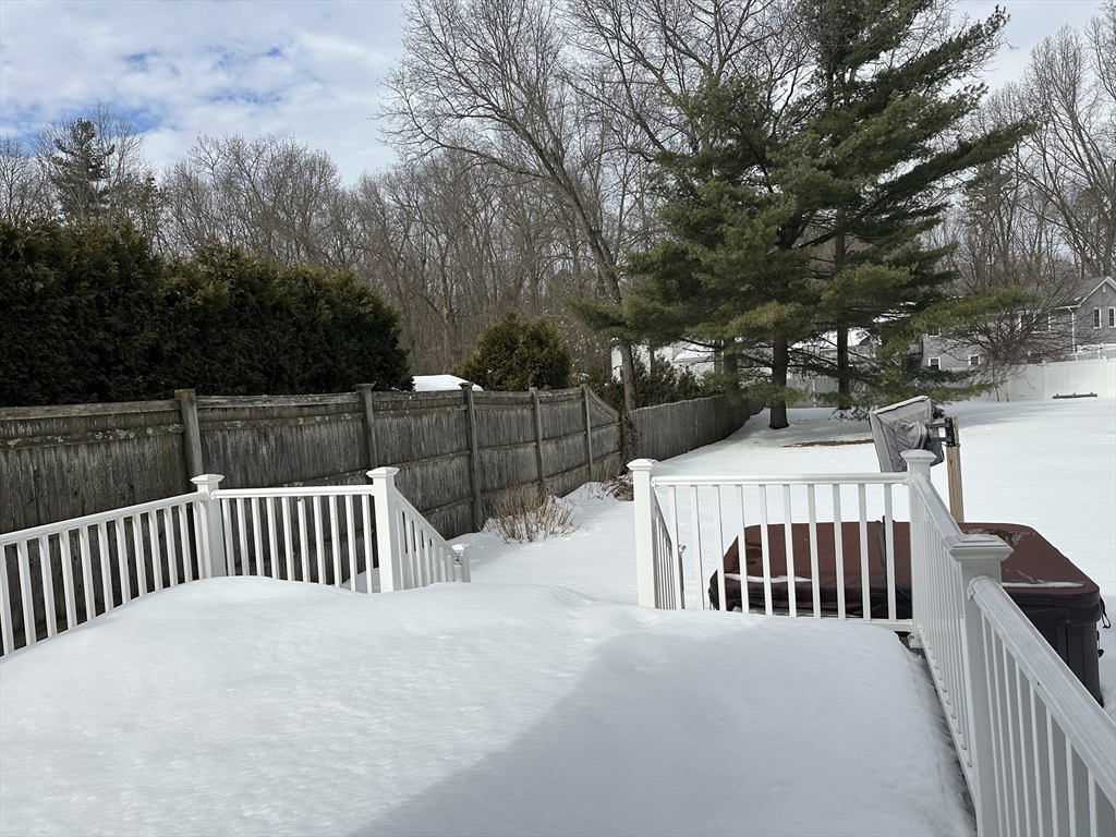 54 Old Fuller Rd Extension Chicopee, MA 01020 - Photo 3 of 25 a view of balcony with wooden floor and fence
