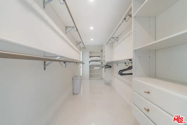 a view of a room with racks on the wall