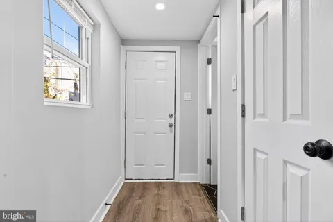 a bathroom with a sink a toilet and vanity