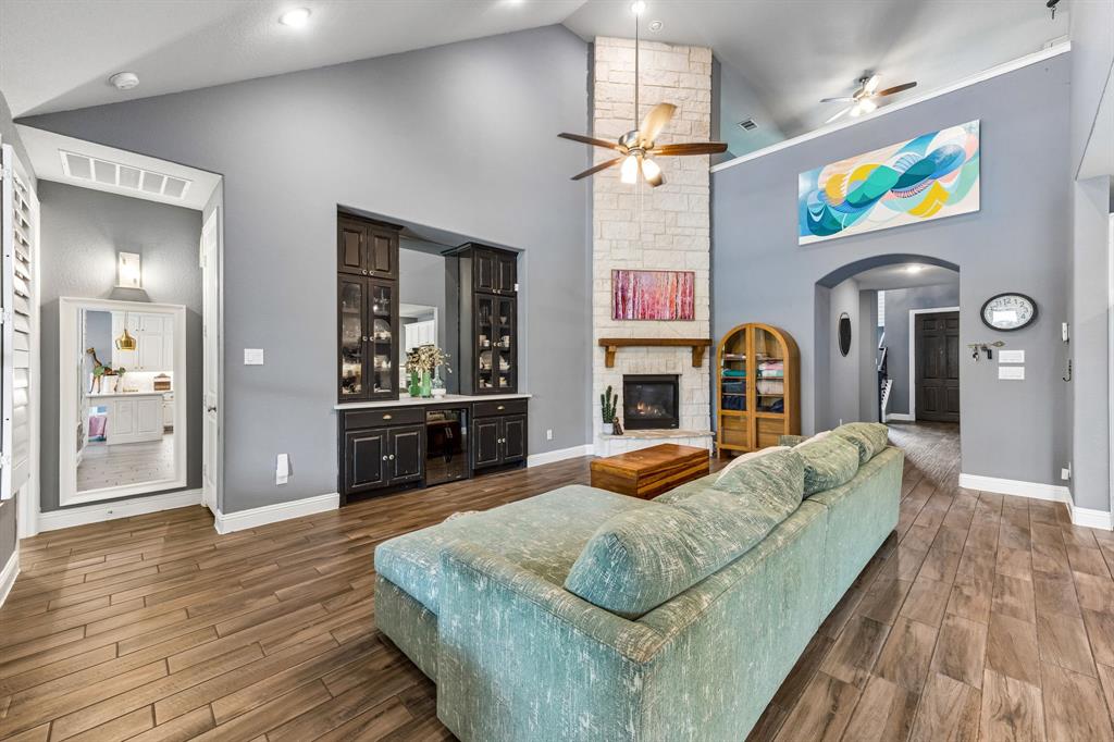 13617 Green Elm Road Fort Worth, TX 76008 - Photo 9 of 40 Gas fireplace and built-ins enhance the living space