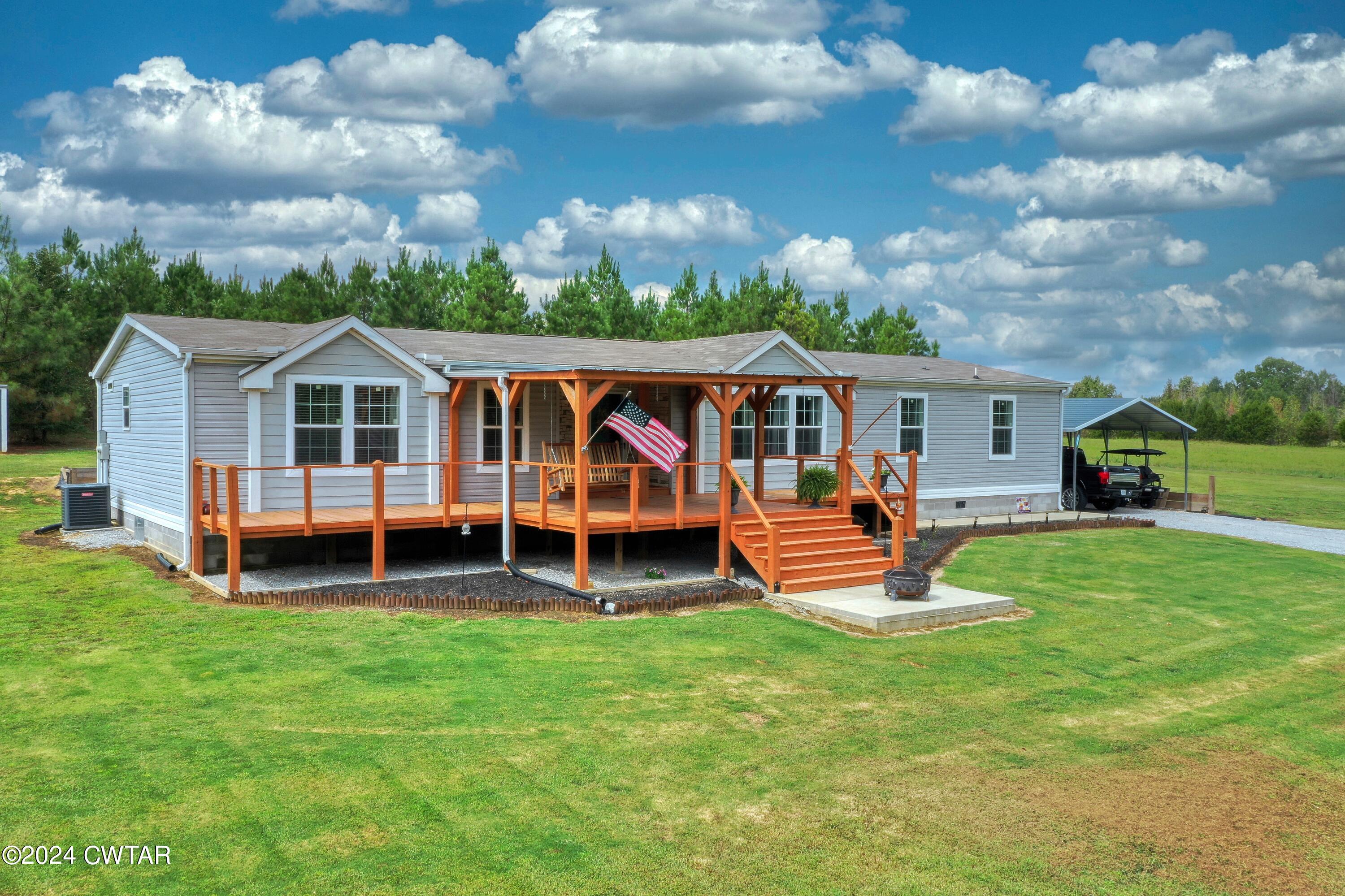 32 Jim Jackson Road Humboldt, TN 38343 - Photo 1 of 35 a view of a house with a yard