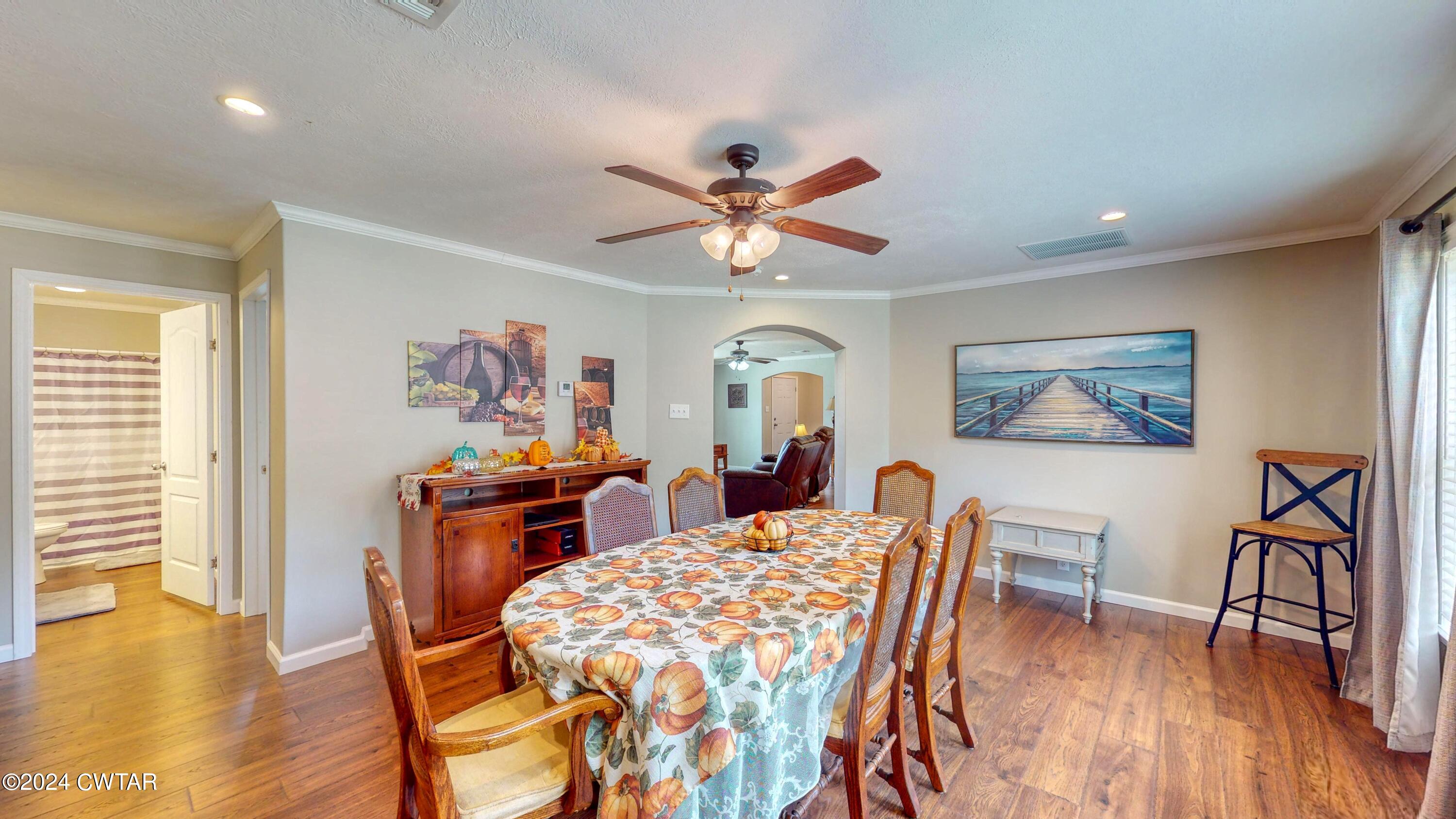 32 Jim Jackson Road Humboldt, TN 38343 - Photo 11 of 35 a view of a dining room with furniture and wooden floor