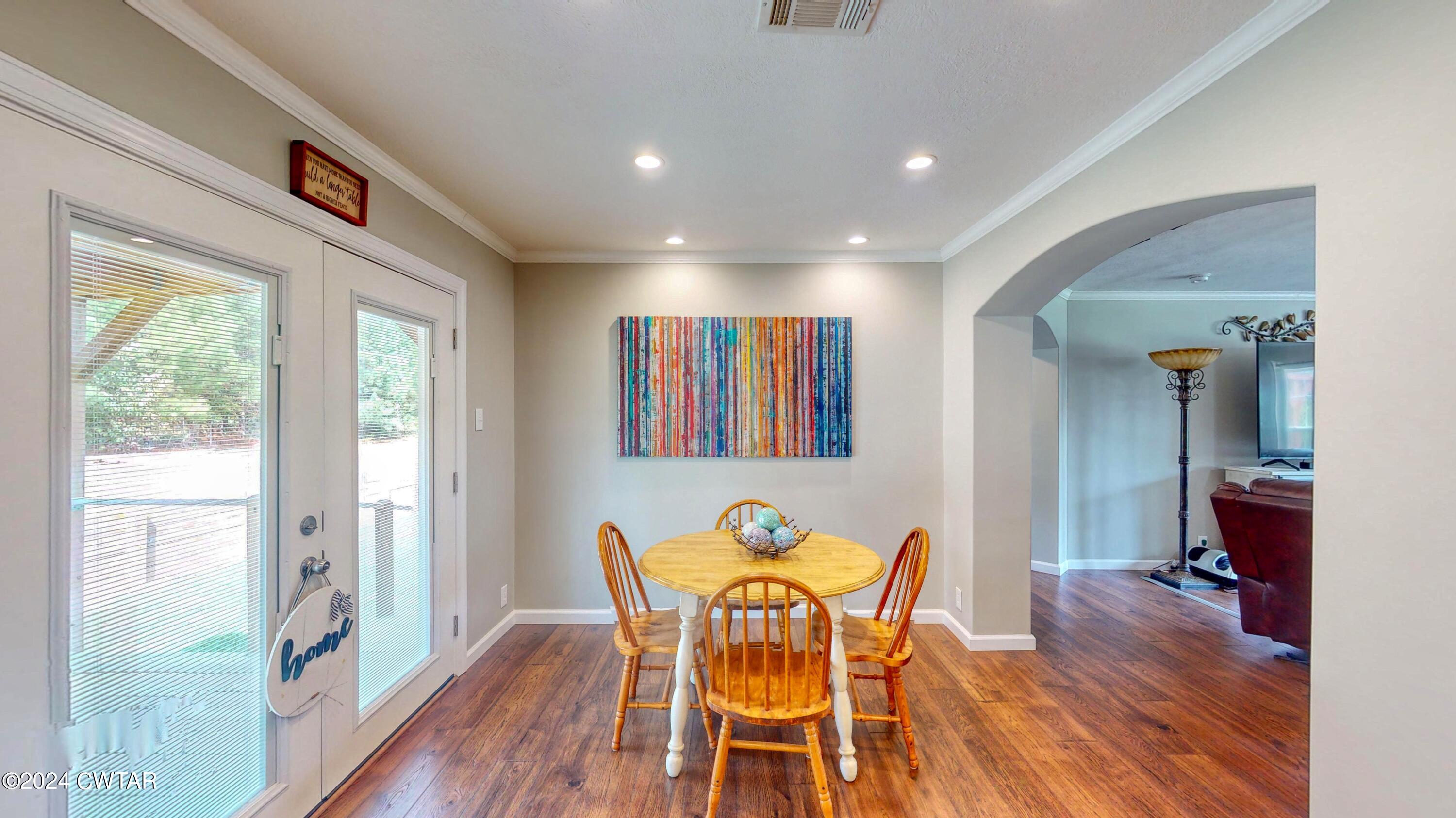 32 Jim Jackson Road Humboldt, TN 38343 - Photo 17 of 35 a view of a dining room with furniture window and wooden floor