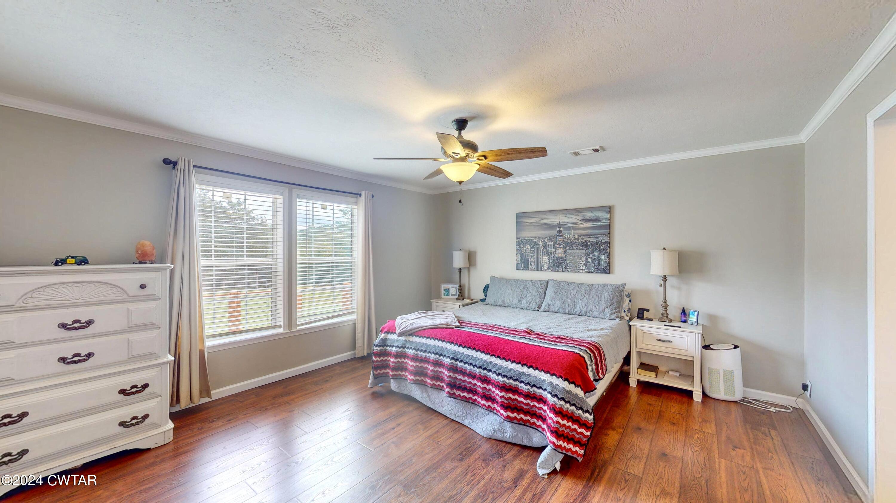 32 Jim Jackson Road Humboldt, TN 38343 - Photo 19 of 35 a living room with a bed furniture and a window