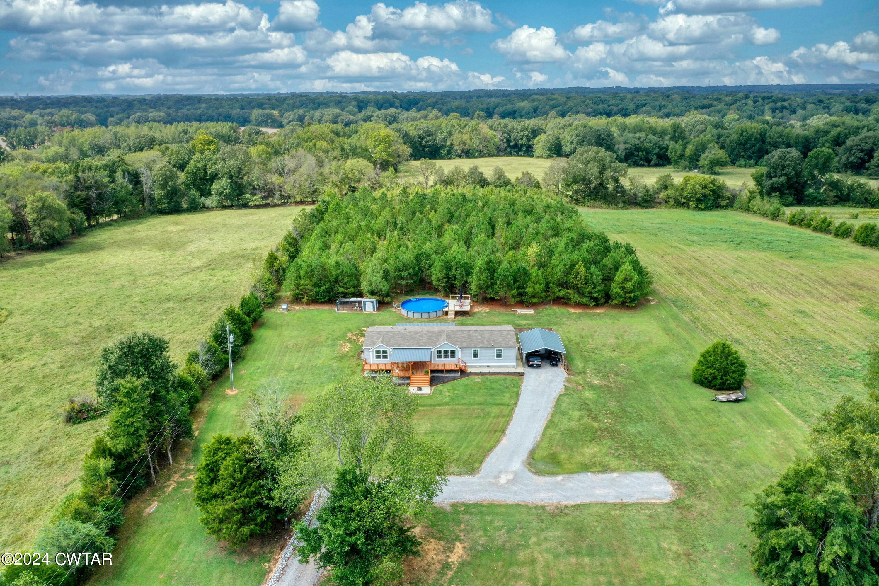 32 Jim Jackson Road Humboldt, TN 38343 - Photo 31 of 35 a aerial view of a house with a yard