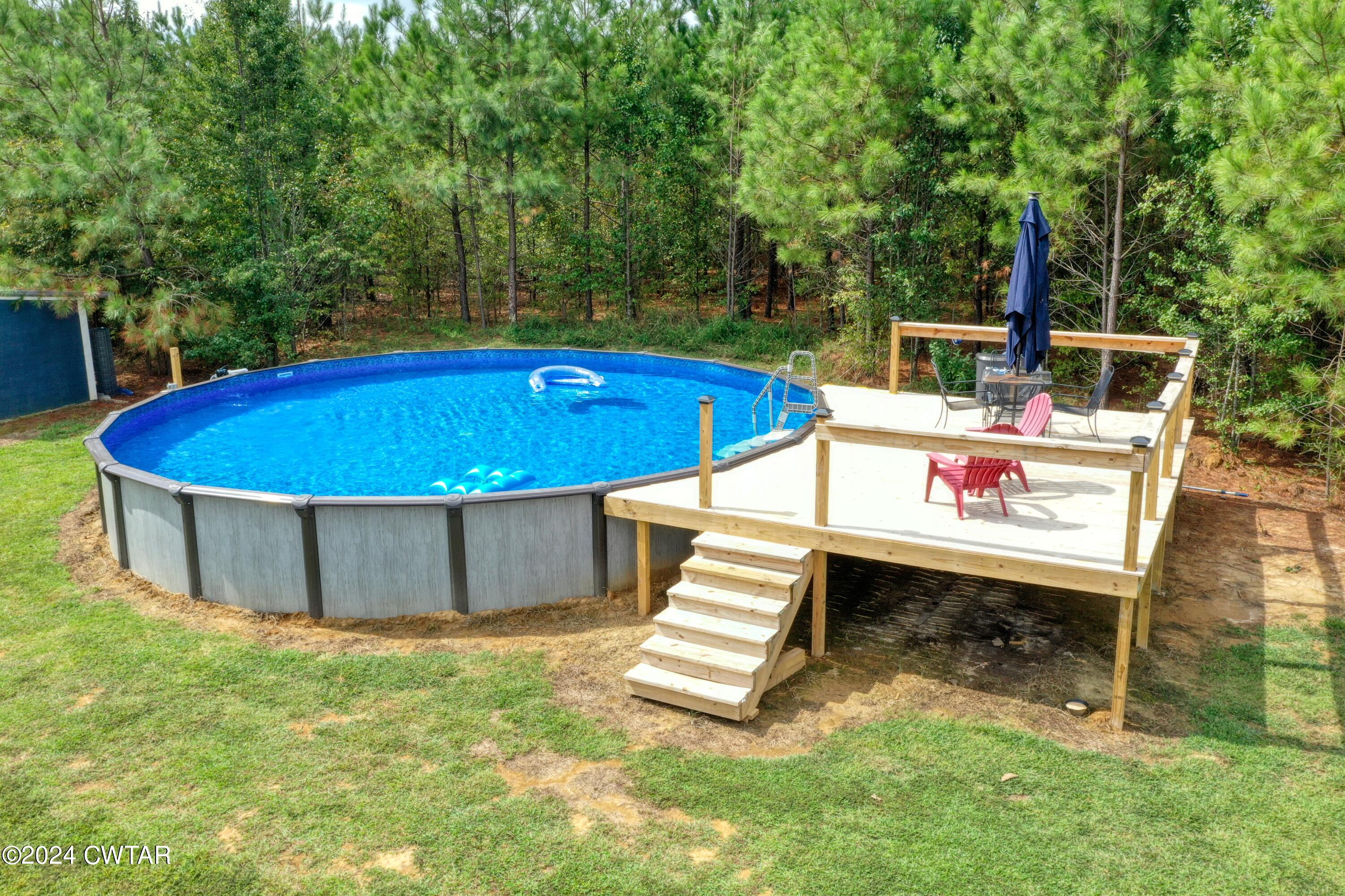 32 Jim Jackson Road Humboldt, TN 38343 - Photo 7 of 35 a view of a backyard with a sink and sitting area