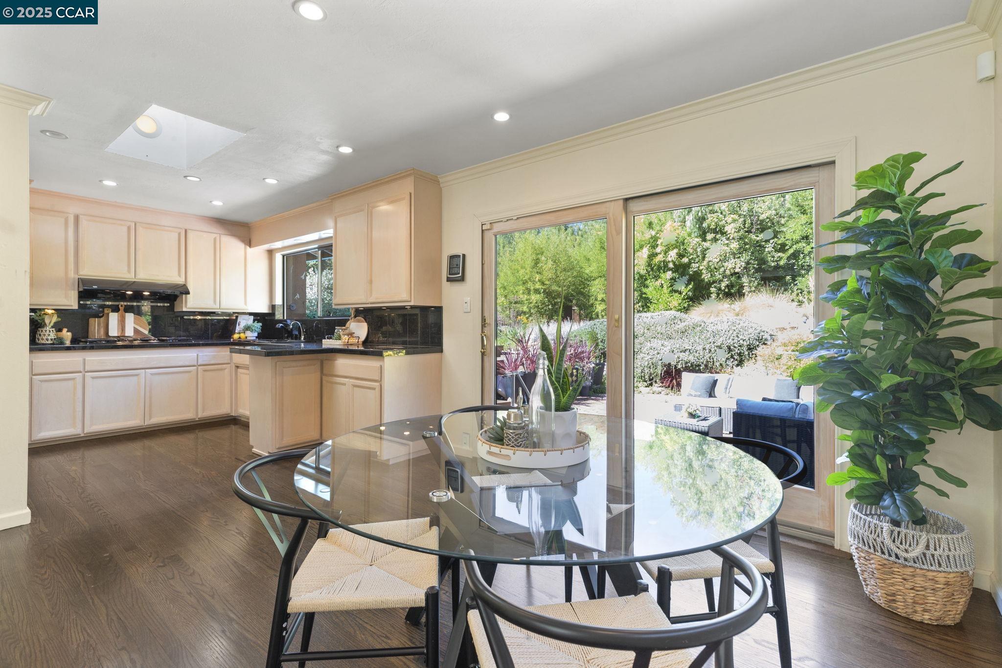275 Gil Blas Road Danville, CA 94526 - Photo 21 of 39 a kitchen with a dining table chairs and refrigerator