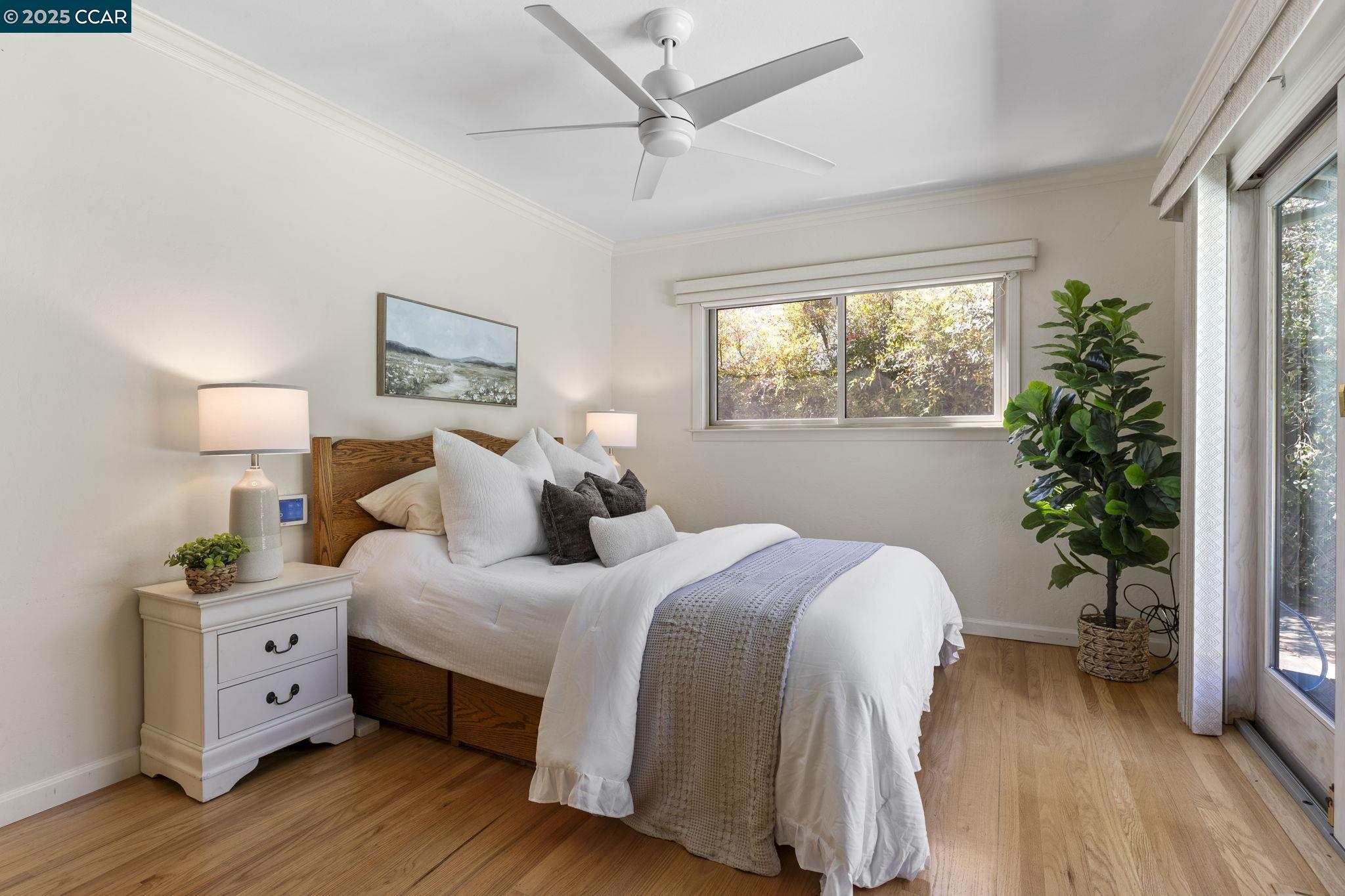 275 Gil Blas Road Danville, CA 94526 - Photo 25 of 39 a bedroom with a bed and a potted plant