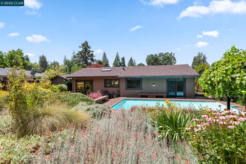 a view of a house with garden