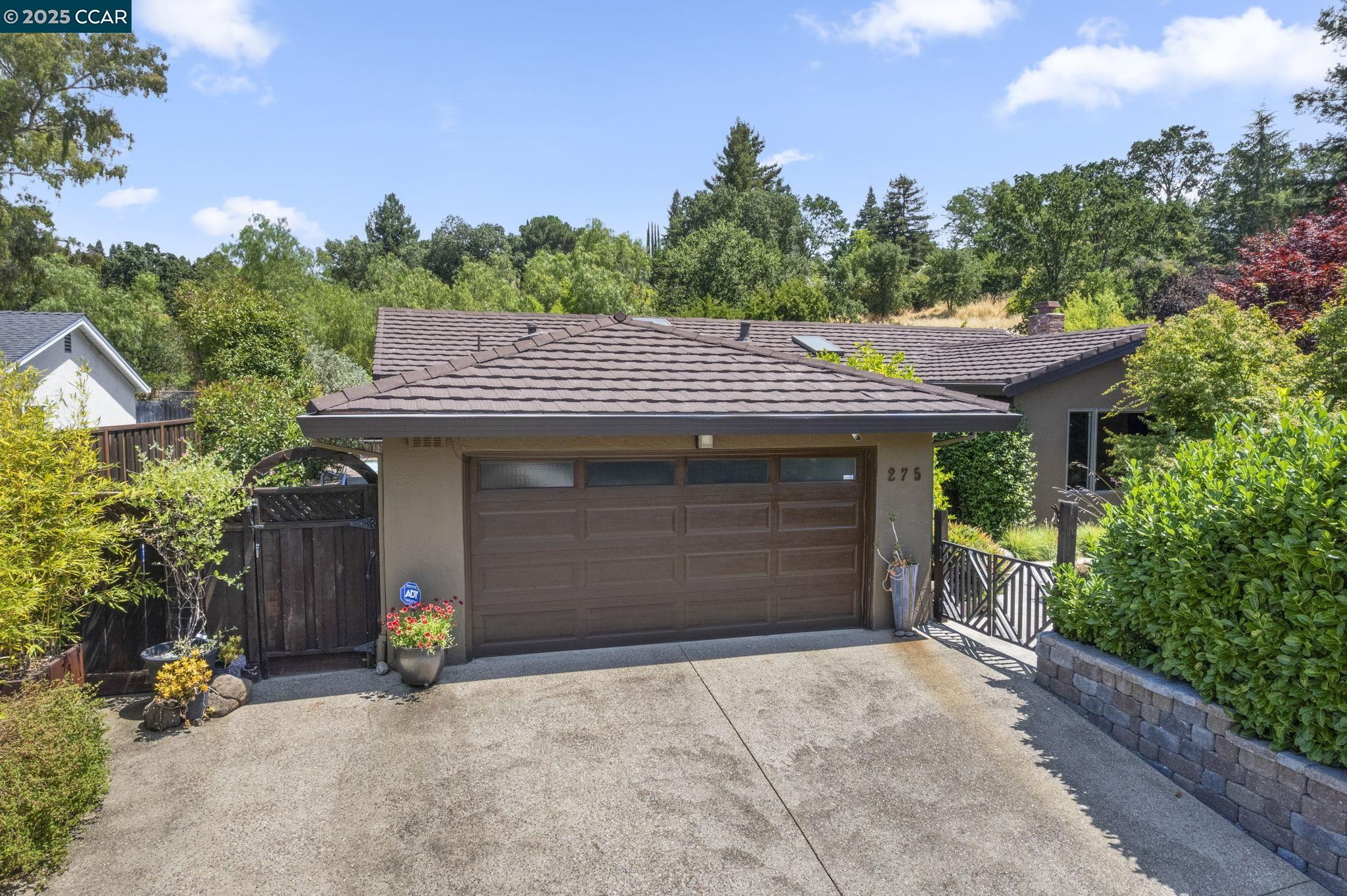 275 Gil Blas Road Danville, CA 94526 - Photo 5 of 39 a view of a house with a garage and sitting area