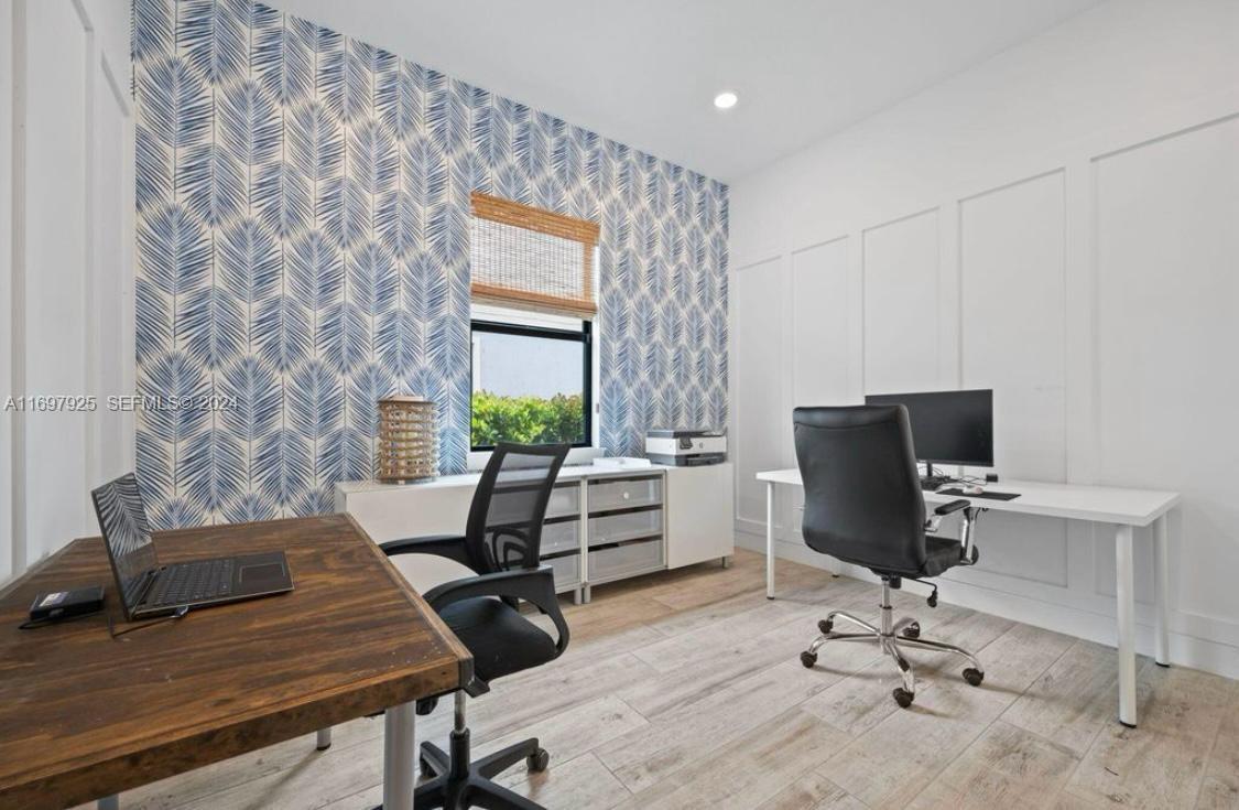 141 Cinder Dunes Point Jupiter, FL 33478 - Photo 22 of 35 a view of a workspace with furniture and a window