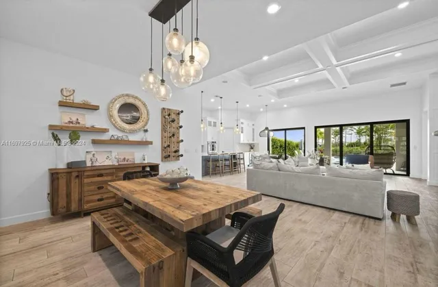 a living room with furniture and a clock