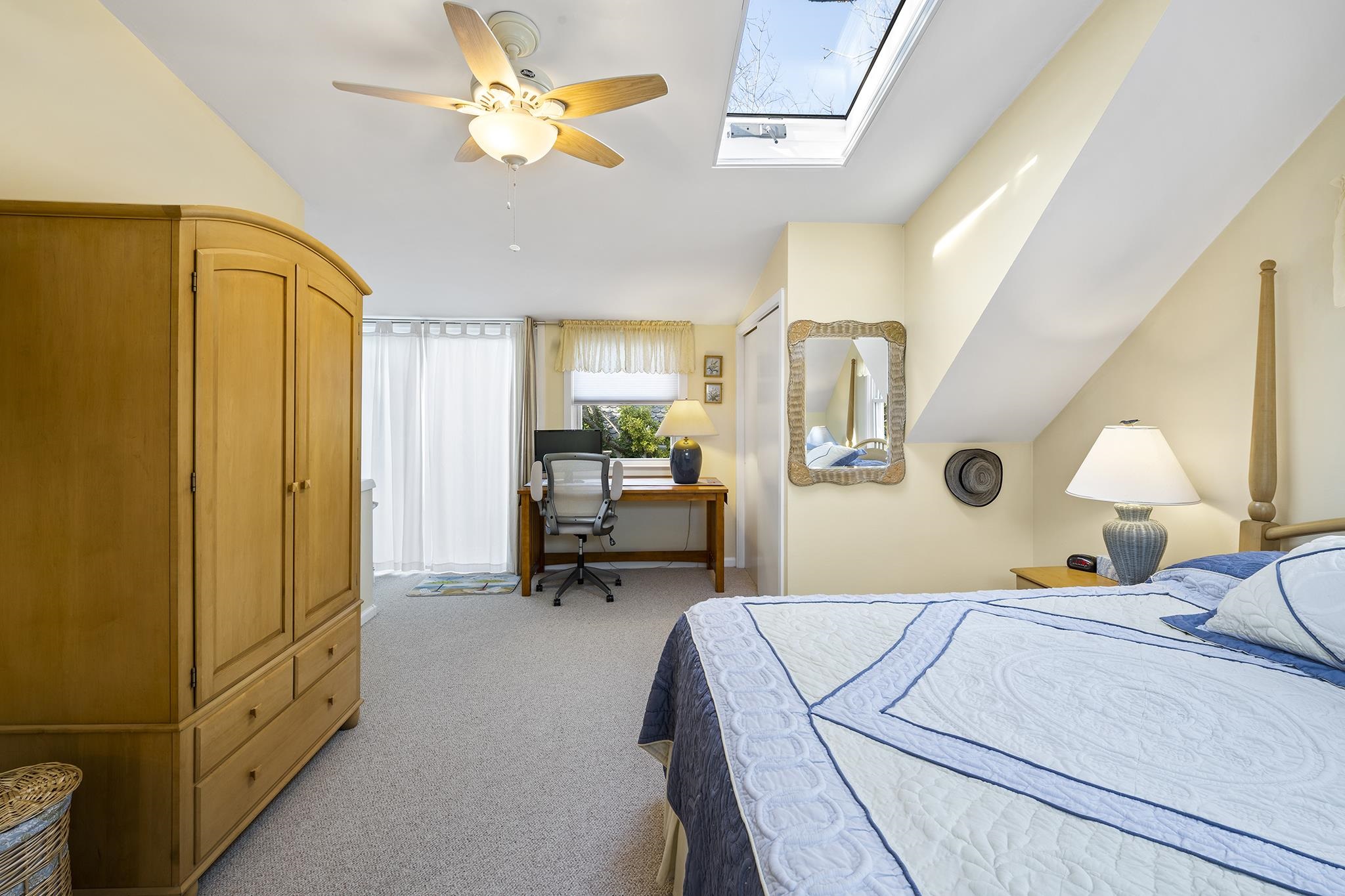513 Robin Road Villas, NJ 08251 - Photo 22 of 34 a bed room with a bed and a lamp