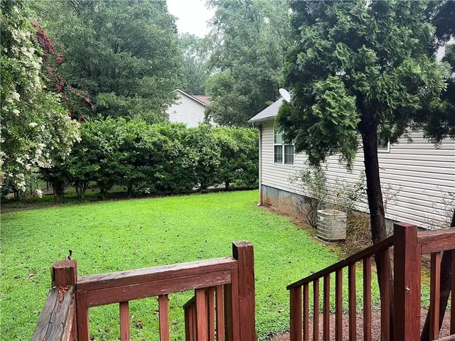 a view of a porch with a yard