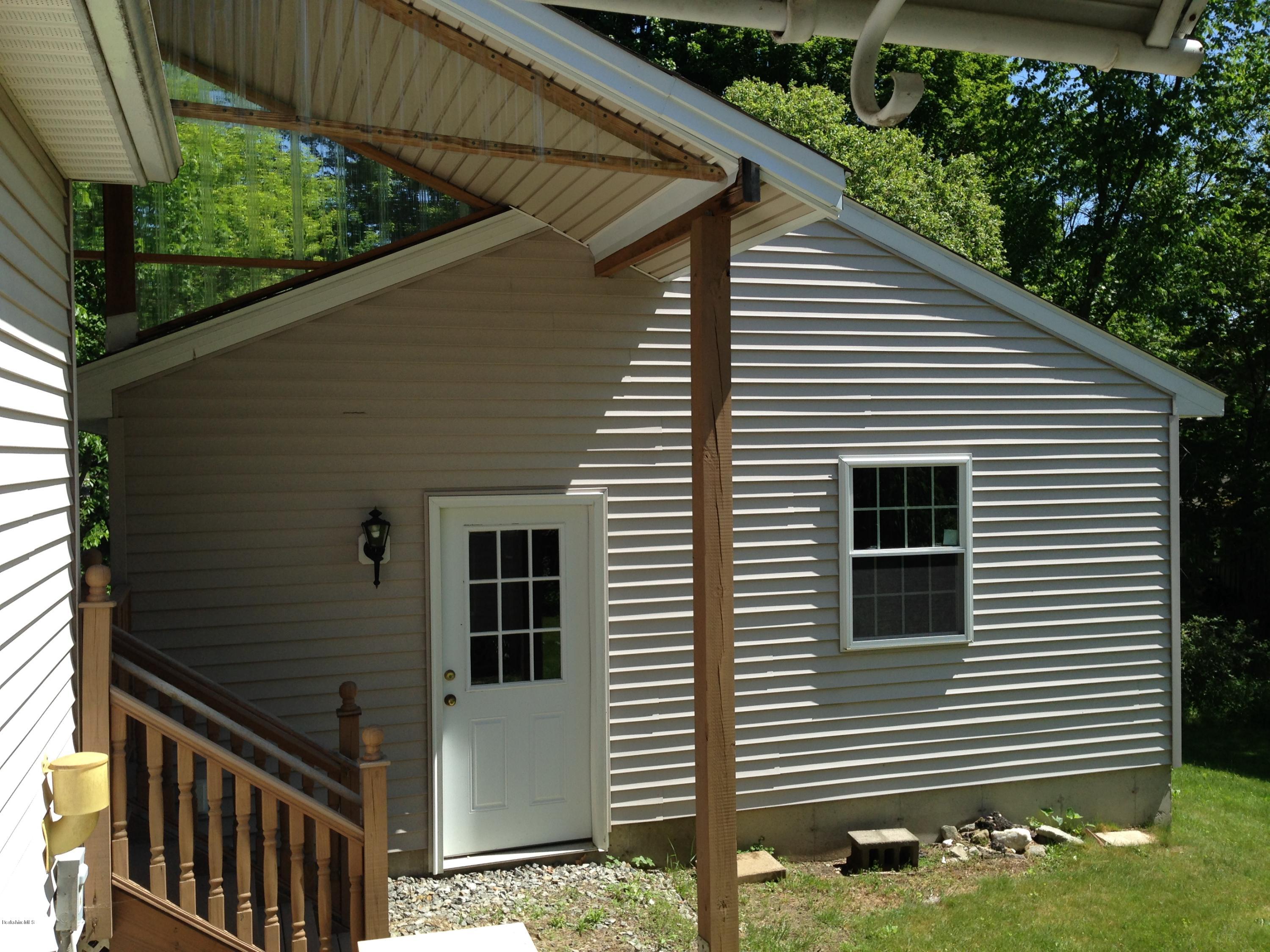 999 Holmes Road Pittsfield, MA 01201 - Photo 5 of 33 side of garage