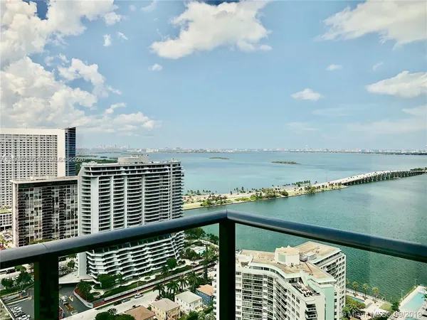 a view of a balcony with an ocean view