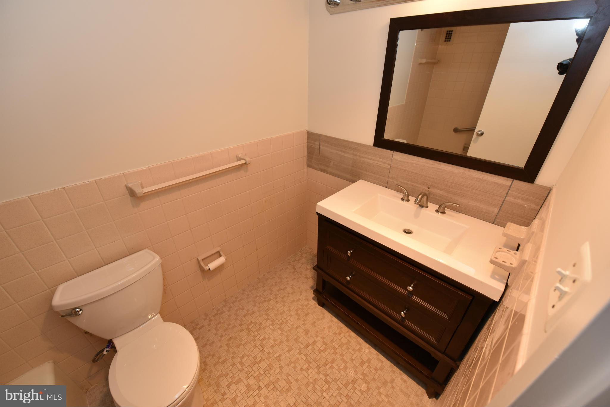 1111 University Boulevard West, Unit 317A Silver Spring, MD 20902 - Photo 19 of 24 Hall Bath
