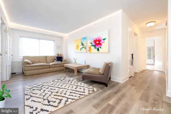 a living room with furniture and a couch