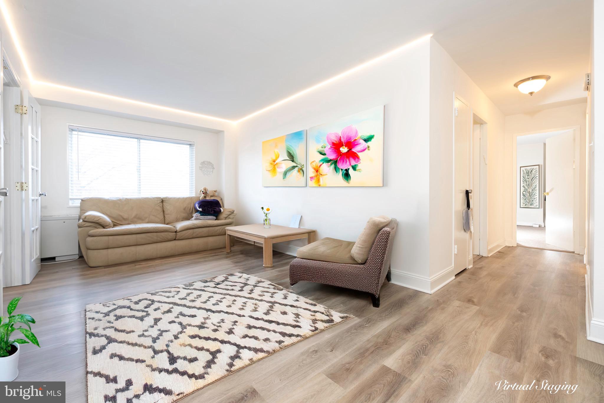 1111 University Boulevard West, Unit 317A Silver Spring, MD 20902 - Photo 2 of 24 Bright living room